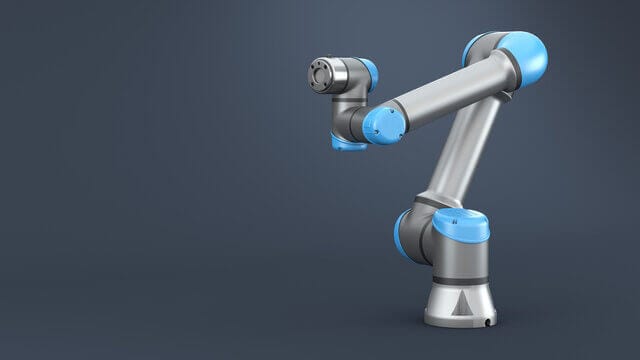 Universal Robots UR5e Collaborative Robot on a dark gray background