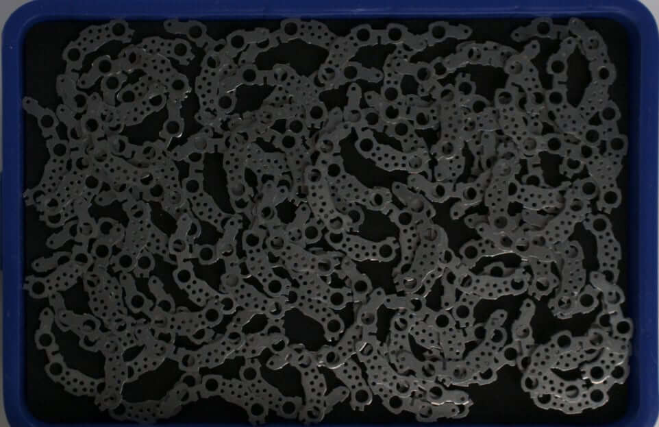 original 2D image of randomly arranged metal items