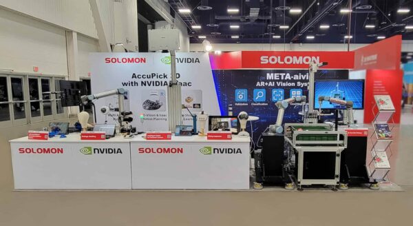 Solomon CES 2025 booth showcasing NVIDIA Isaac integration with AccuPick 3D and META-aivi systems, featuring robotic arms, AI vision demos, and automation displays.