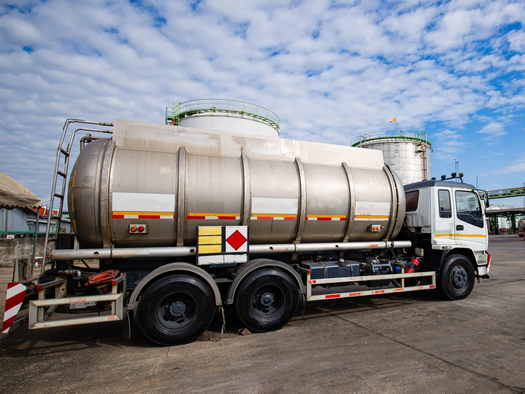 a chemical tanker truck parked in a petroleum depot
