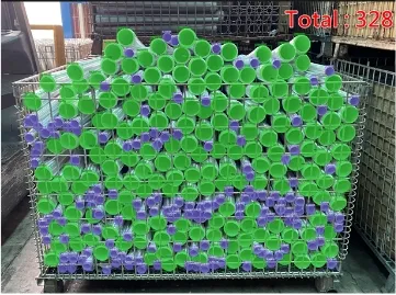 Automated counting of metal tubes using META-aivi AR + AI vision. Bounding boxes (green and purple) overlaid on the pipes, displaying a Total: 328 count for inventory management.