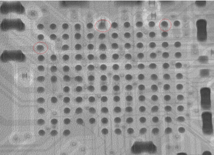 X-ray view of a ball grid array where the AI inspection system has flagged 'Wrong Size' defects, identifying abnormal solder ball dimensions in the assembly.
