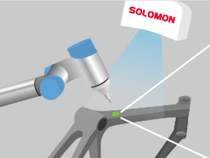 Automating Grinding Processes for Molded Products graphic of a metal bicycle frame being grinded by vision guided robotics with UR robot arm and SolScan industrial 3D camera