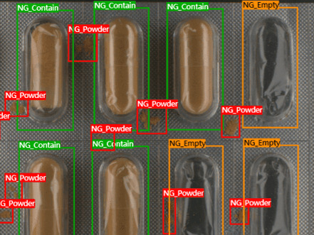 A close-up view of a pharmaceutical blister pack undergoing AI vision inspection. The system uses labels like "NG_Empty" to clearly identify missing capsules, "NG_Powder" for detected foreign powder, and "NG_Contain" for containing a capsule but with issues, demonstrating Presence/Absence detection and quality control in packaging.